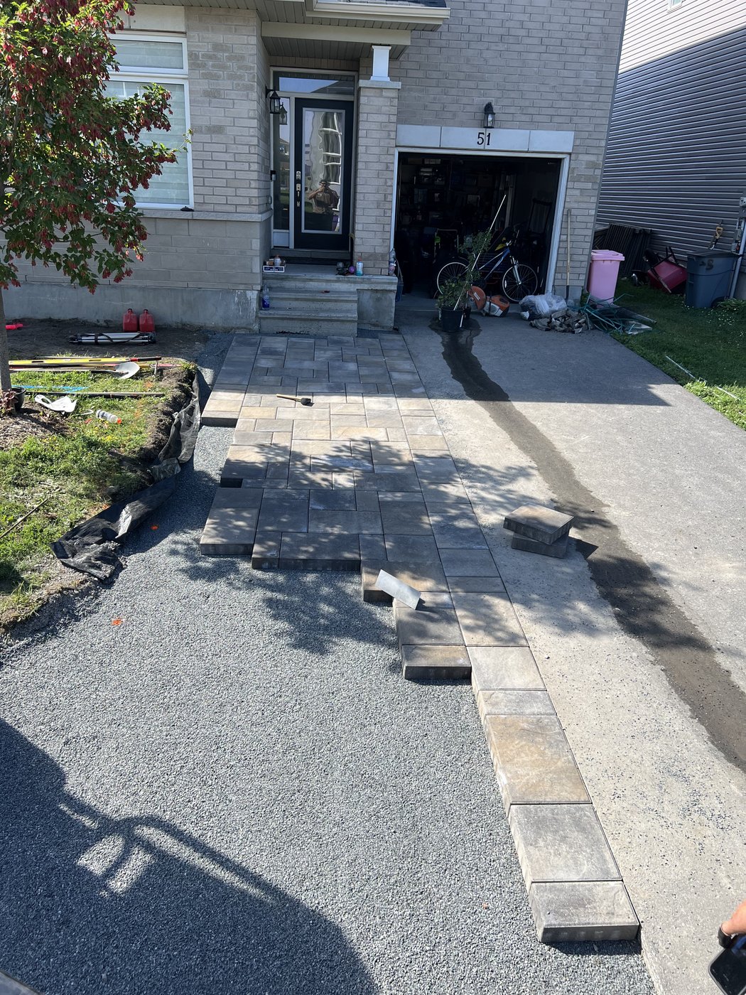 New paver walkway being laid up to the front entrance